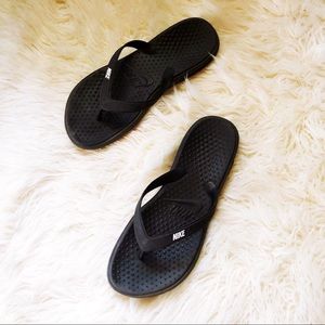 Nike black flip flops